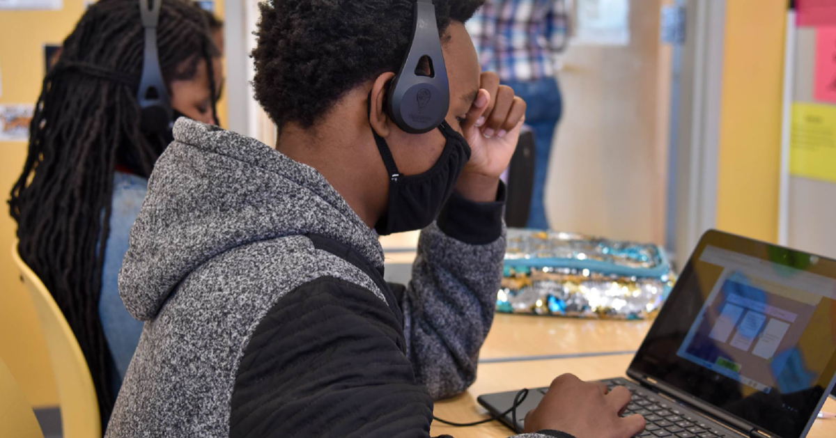 Children from Baltimore's Cherry Hill schools working on devices